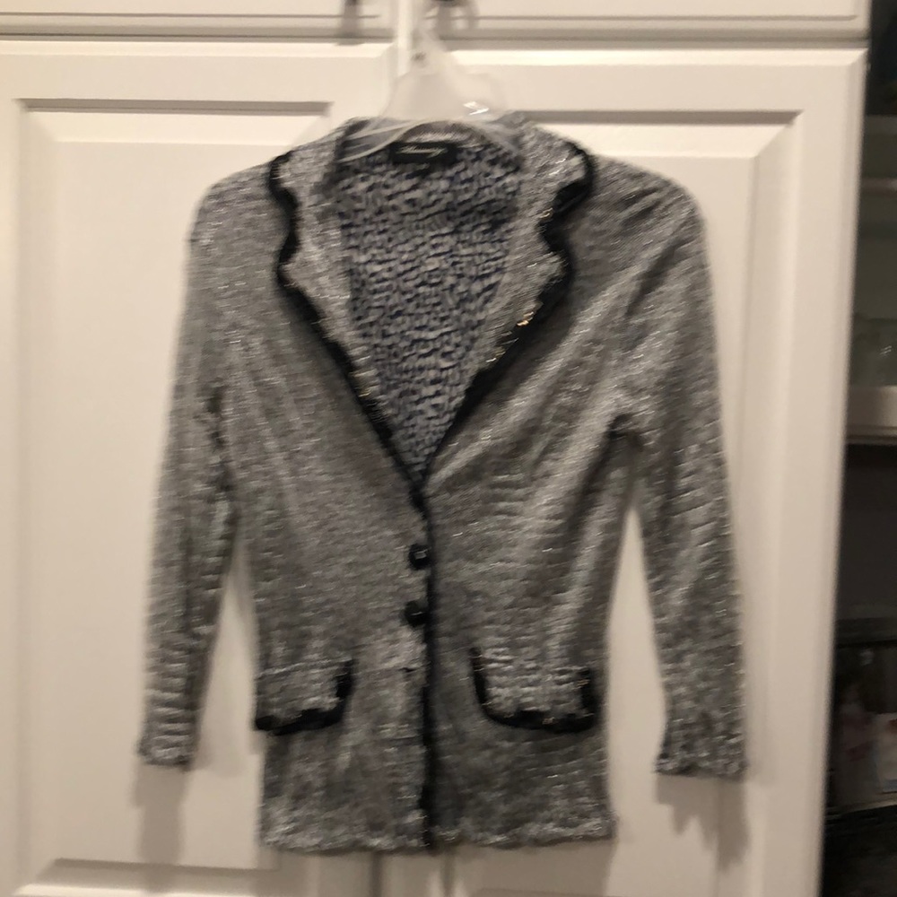 Dressy silver mesh jacket with sparkly embellished collar and pockets.